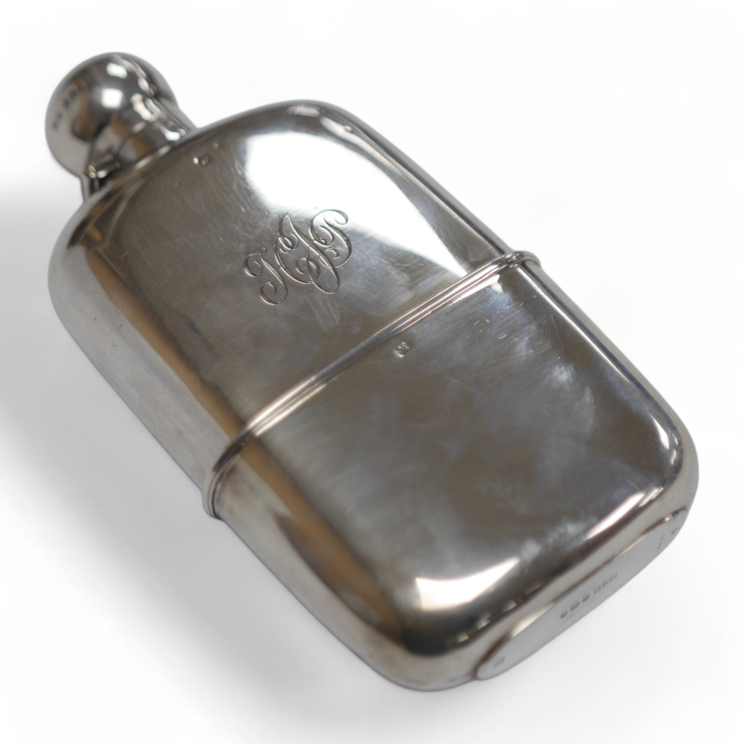 A late Victorian silver hip flask, by James Dixon & Sons, Sheffield, 1895, with engraved monogram, 15.5cm, 7.3oz. Condition - fair